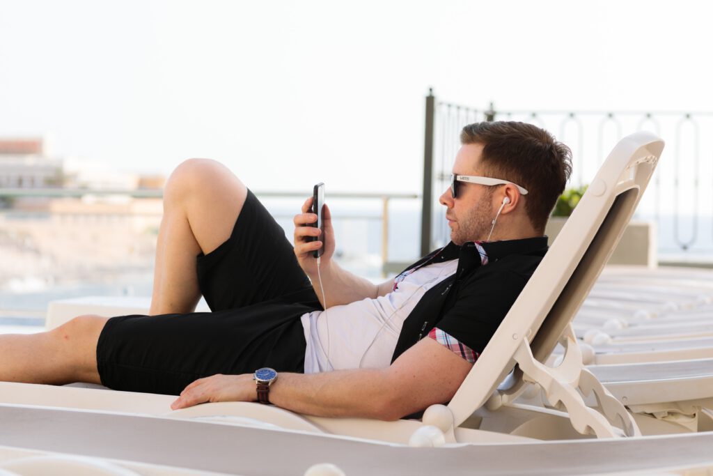 guy sitting on a chair living his freelance product manager best life